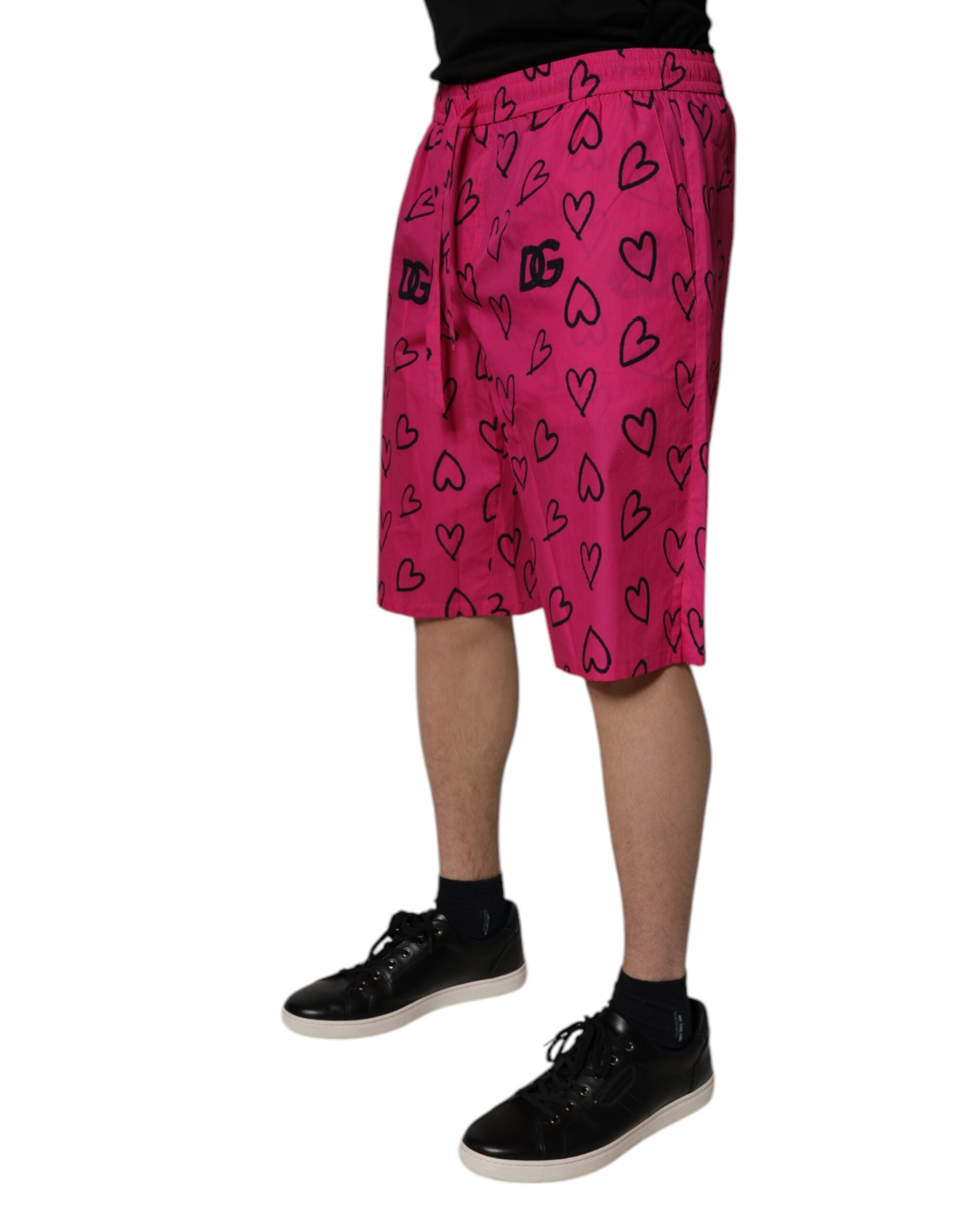 Dolce & Gabbana Pink Cotton Heart Print Bermuda Shorts -   -  Dolce & Gabbana. Dolce & Gabbana Pink Cotton Heart Print Bermuda Shorts -   -  Dolce & Gabbana.