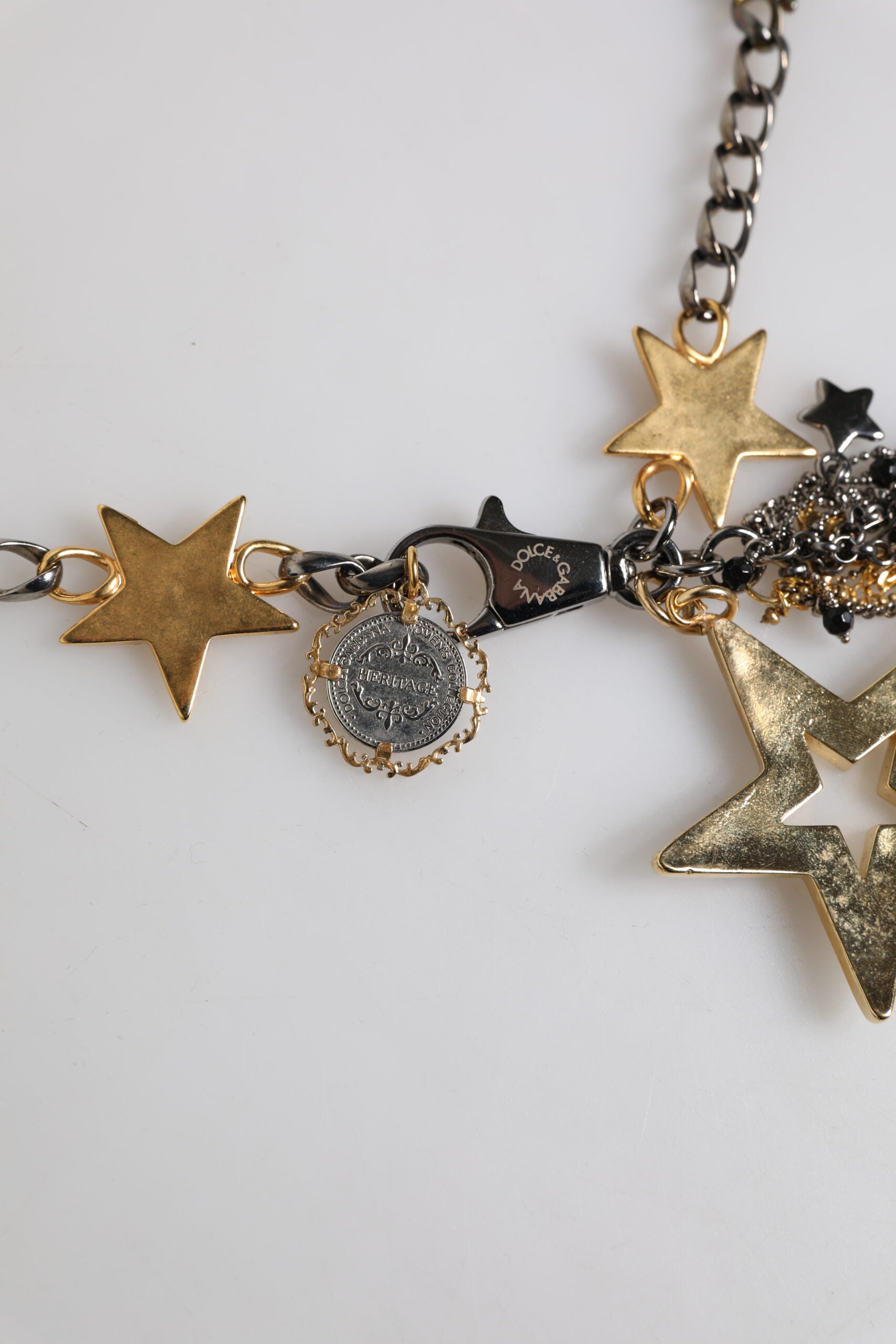 Dolce & Gabbana Silver Gold Brass Embellished Waist Chain Belt -   -  Dolce & Gabbana. Dolce & Gabbana Silver Gold Brass Embellished Waist Chain Belt -   -  Dolce & Gabbana.