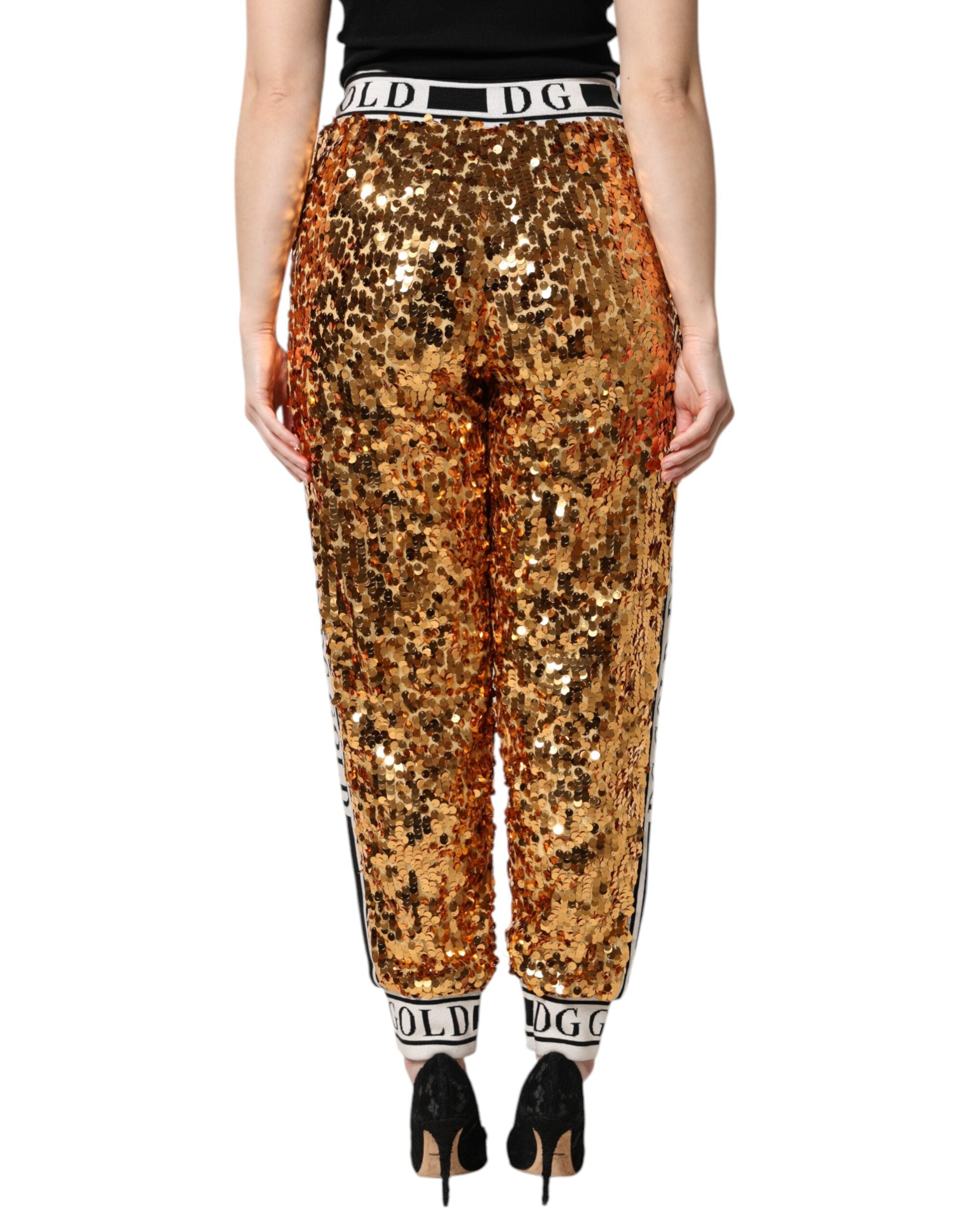 Dolce & Gabbana Metallic Gold DG Logo Sequined Jogger Pants -   -  Dolce & Gabbana. Dolce & Gabbana Metallic Gold DG Logo Sequined Jogger Pants -   -  Dolce & Gabbana.