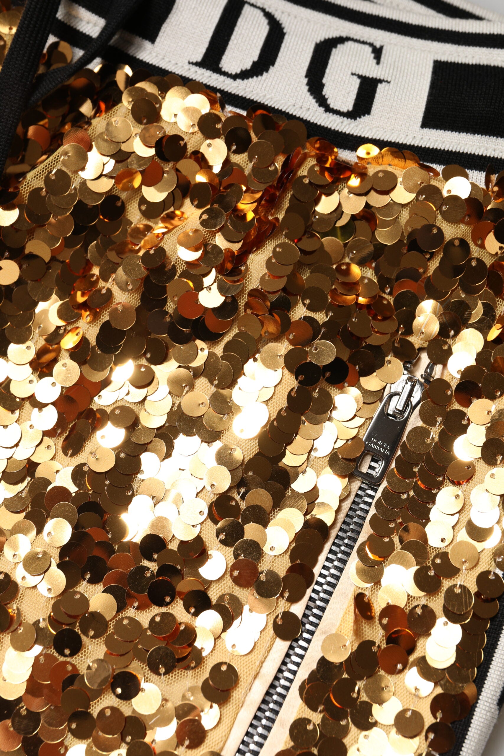 Dolce & Gabbana Metallic Gold DG Logo Sequined Jogger Pants -   -  Dolce & Gabbana. Dolce & Gabbana Metallic Gold DG Logo Sequined Jogger Pants -   -  Dolce & Gabbana.