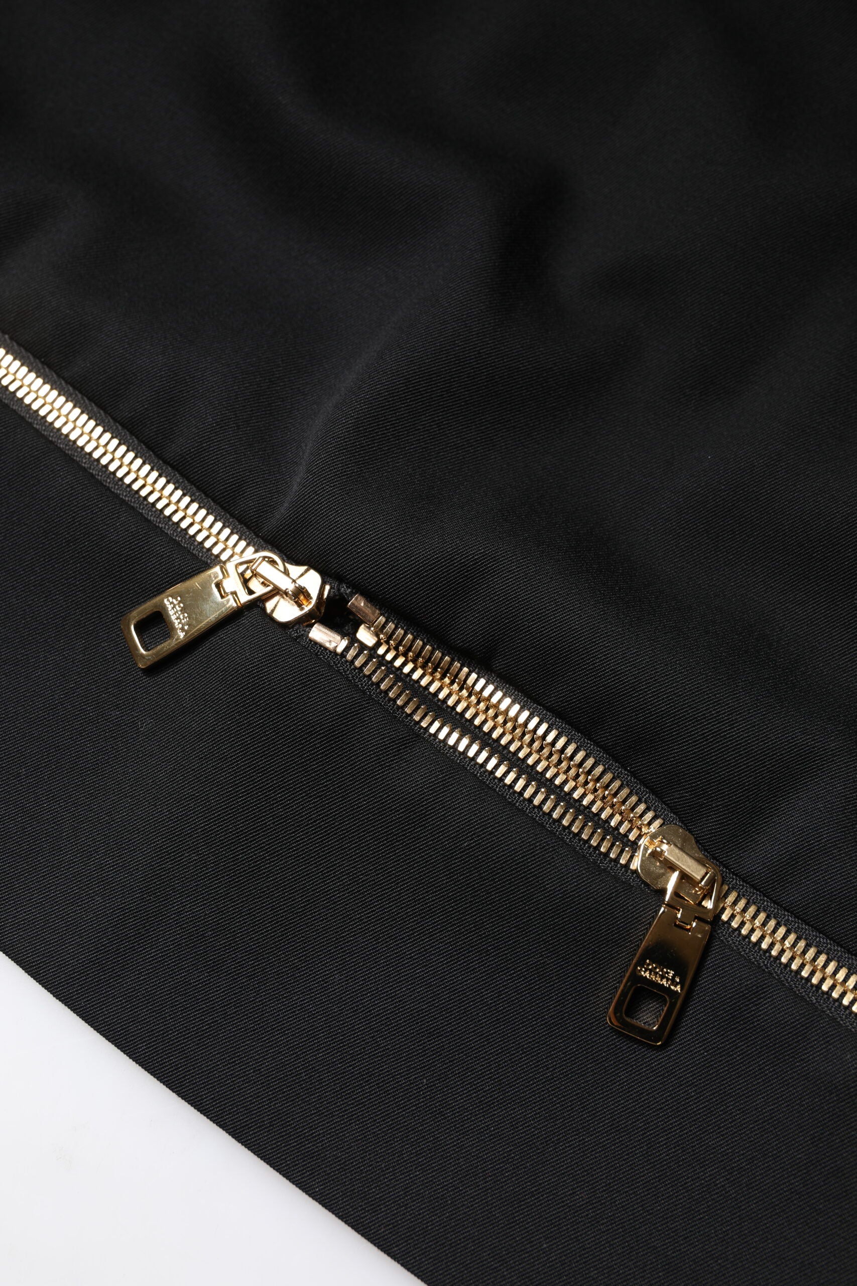 Dolce & Gabbana Black Virgin Wool High Waisted Mini Skirt -   -  Dolce & Gabbana. Dolce & Gabbana Black Virgin Wool High Waisted Mini Skirt -   -  Dolce & Gabbana.