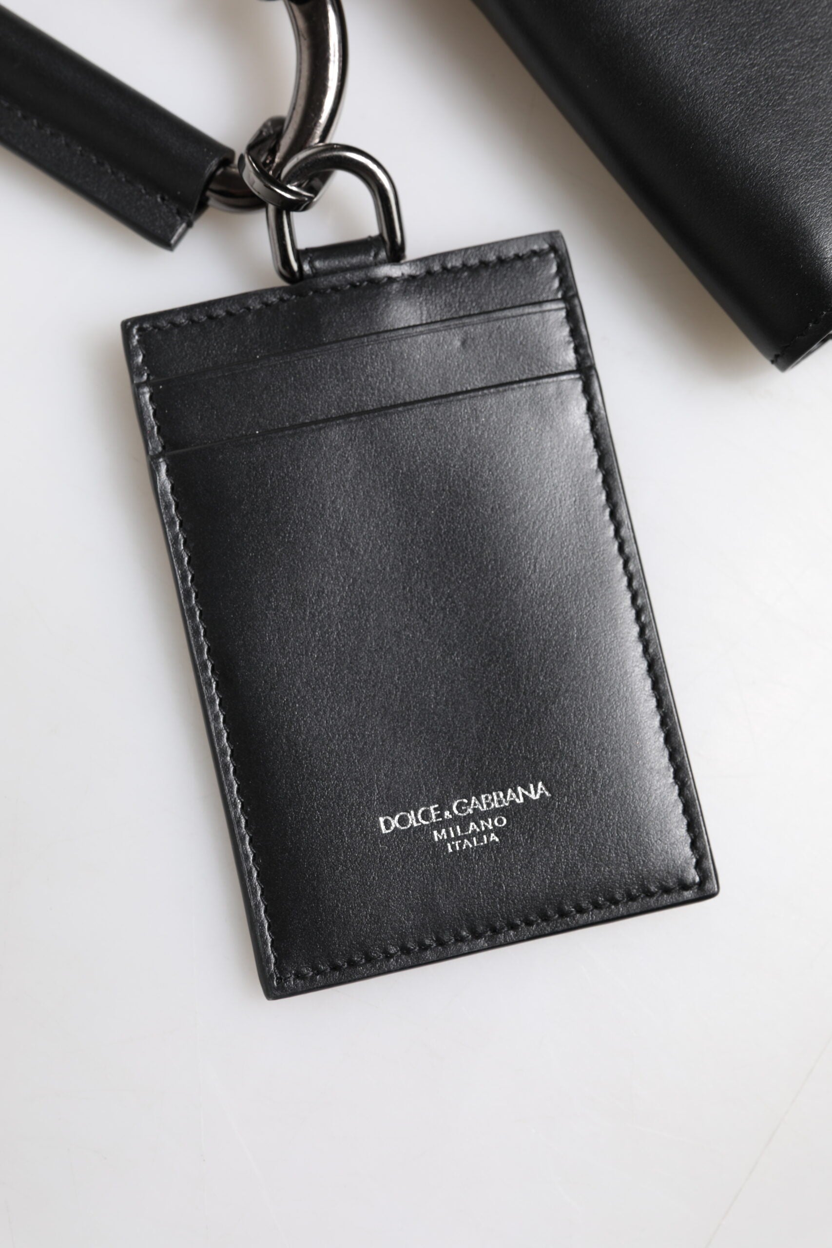 Dolce & Gabbana Black Leather Lanyard Zip Around Card Holder Wallet -   -  Dolce & Gabbana. Dolce & Gabbana Black Leather Lanyard Zip Around Card Holder Wallet -   -  Dolce & Gabbana.