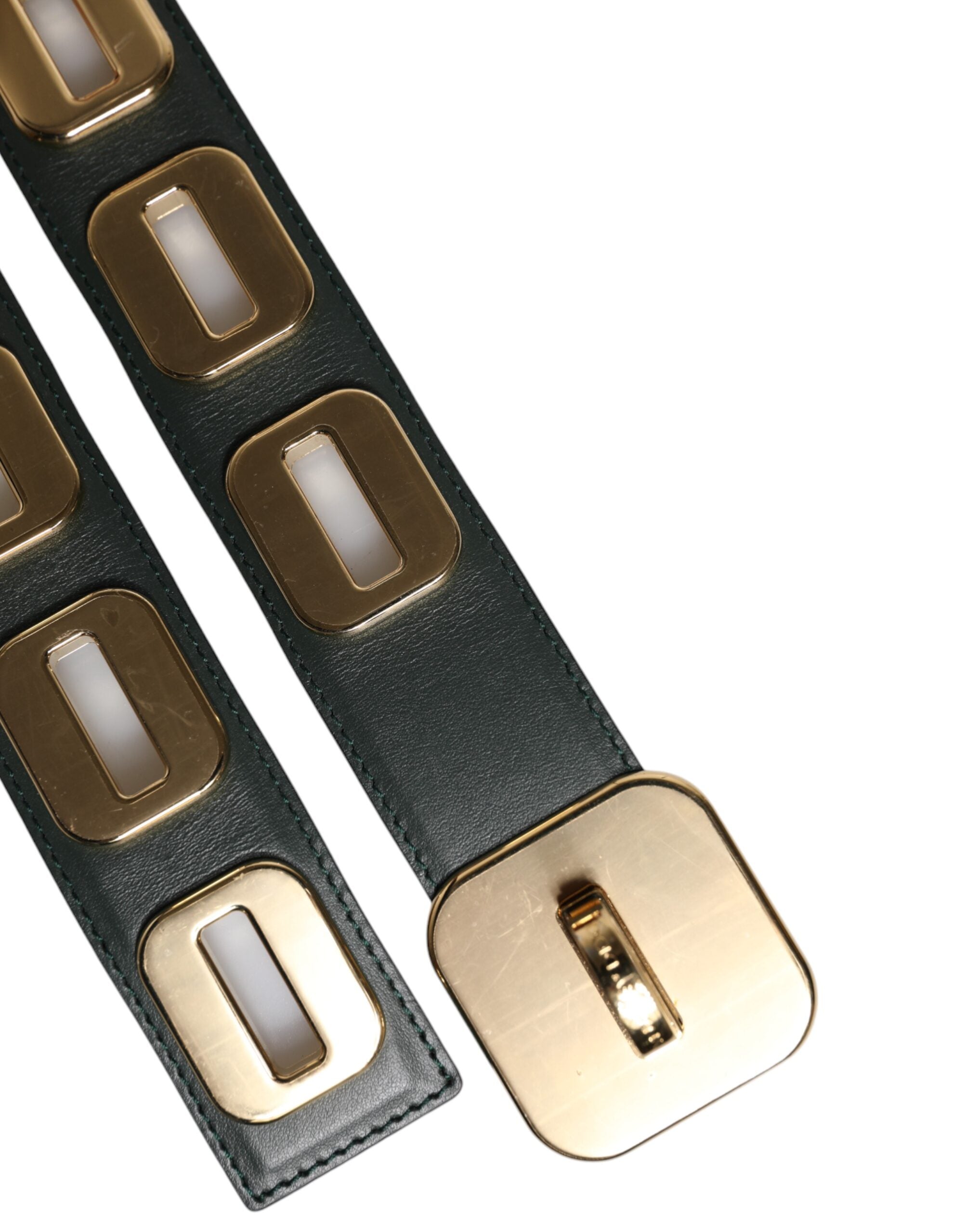 Dolce & Gabbana Green Leather Gold Tone Rotating Buckle Belt -   -  Dolce & Gabbana. Dolce & Gabbana Green Leather Gold Tone Rotating Buckle Belt -   -  Dolce & Gabbana.