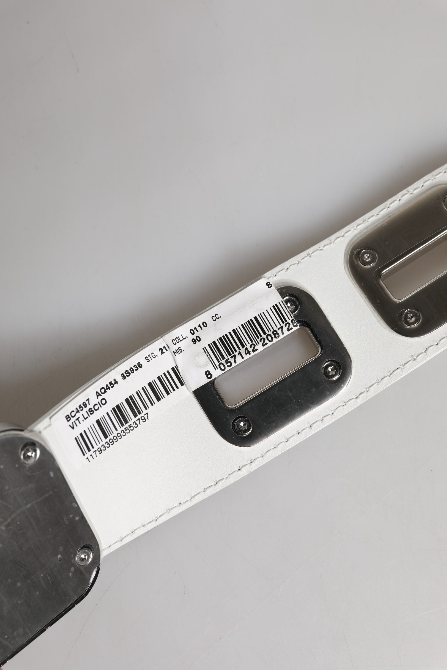 Dolce & Gabbana White Leather Gold Tone Rotating Buckle Belt -   -  Dolce & Gabbana. Dolce & Gabbana White Leather Gold Tone Rotating Buckle Belt -   -  Dolce & Gabbana.