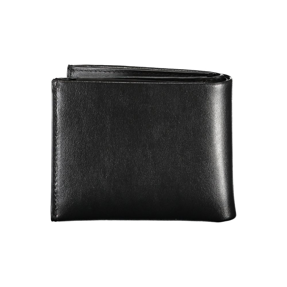 Calvin Klein Elegant Black Leather Dual-Compartment Wallet -  Wallets for Men -  Calvin Klein. Calvin Klein Elegant Black Leather Dual-Compartment Wallet -  Wallets for Men -  Calvin Klein.