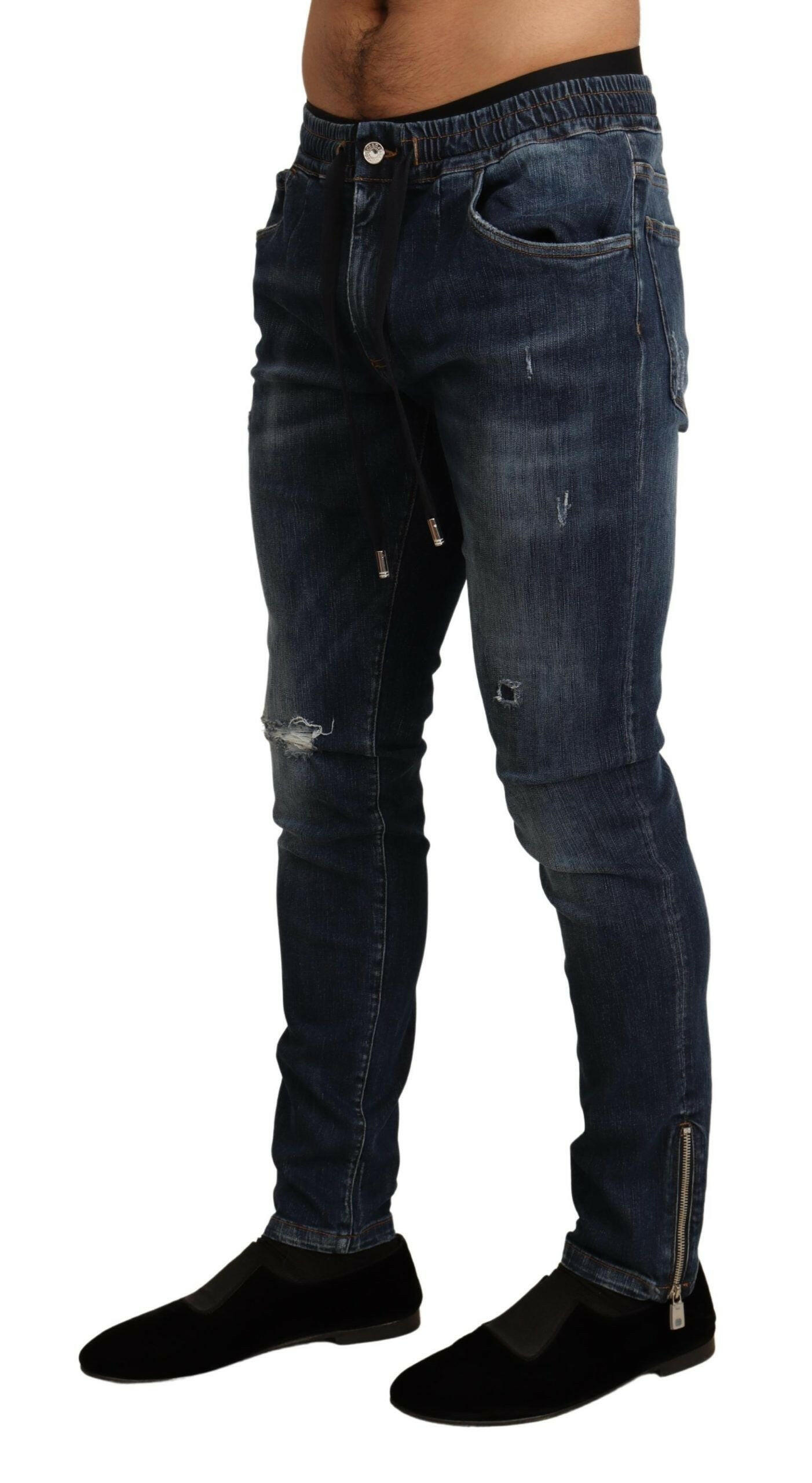 Dolce & Gabbana Blue Cotton Stretch Tattered Denim Jeans -   -  Dolce & Gabbana.
