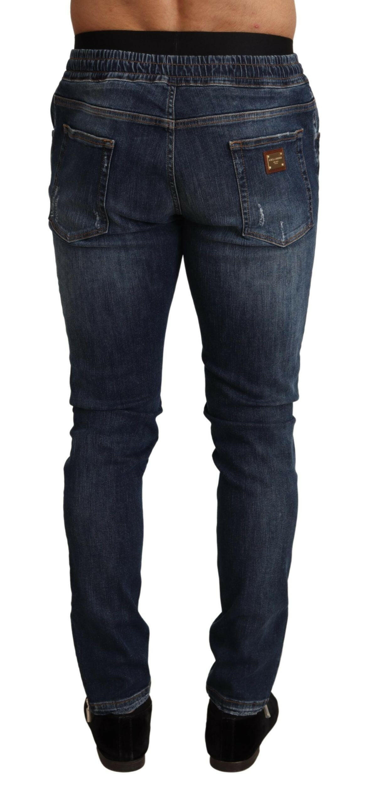 Dolce & Gabbana Blue Cotton Stretch Tattered Denim Jeans -   -  Dolce & Gabbana.