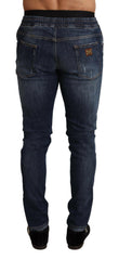 Dolce & Gabbana Blue Cotton Stretch Tattered Denim Jeans -   -  Dolce & Gabbana.