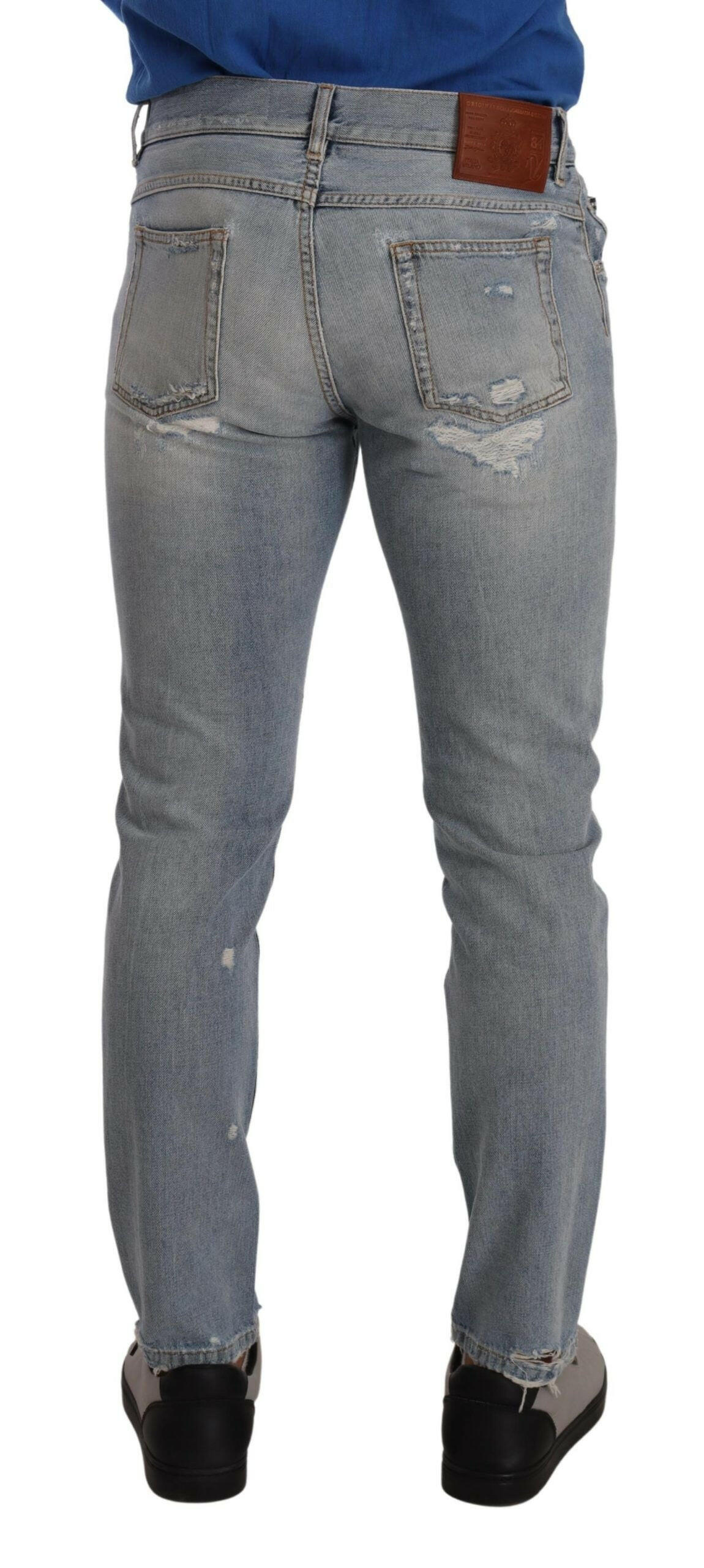 Dolce & Gabbana Light Blue Tattered Cotton Regular Denim Jeans -   -  Dolce & Gabbana.
