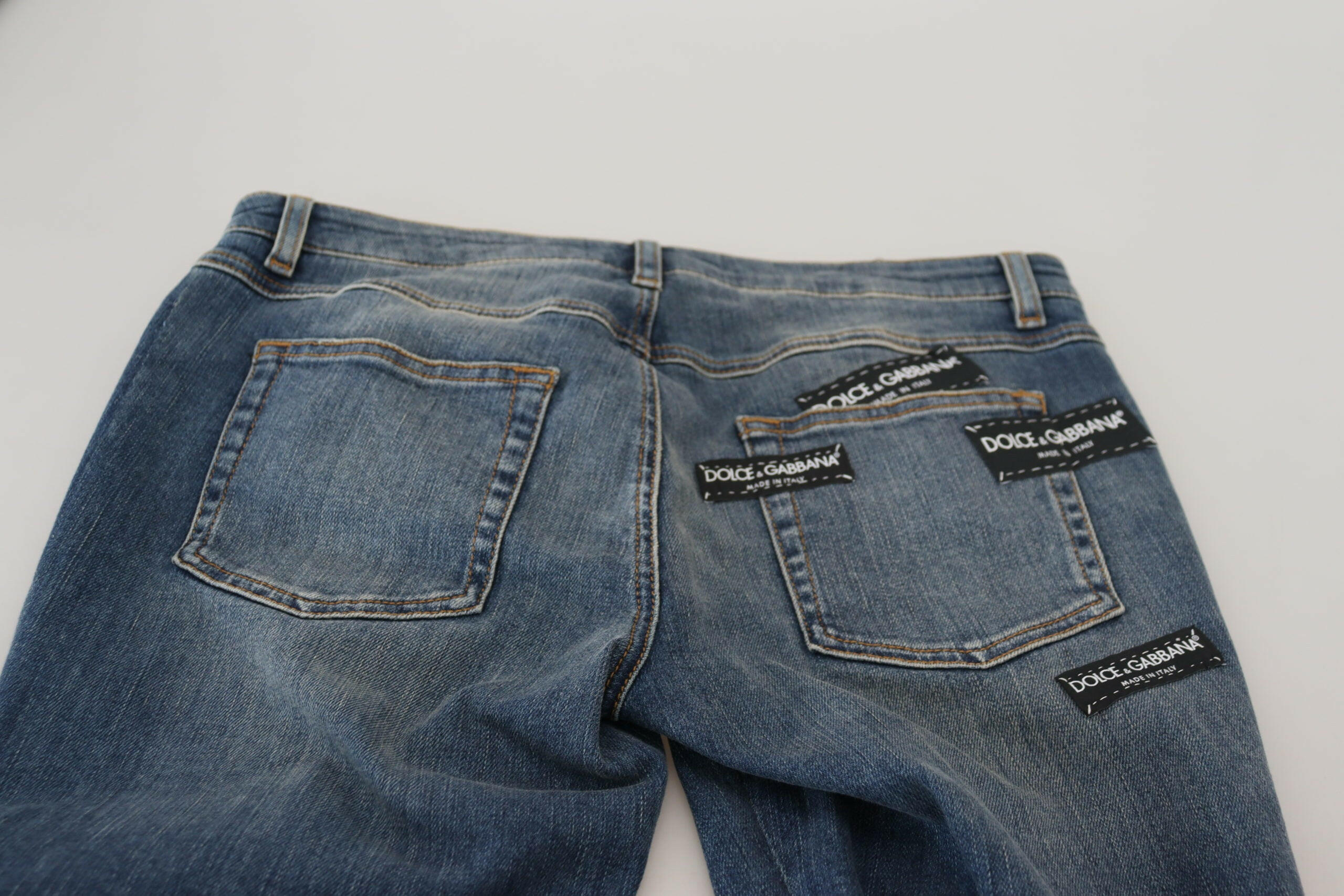 Dolce & Gabbana Blue Washed Cotton Tattered Denim Jeans -   -  Dolce & Gabbana.