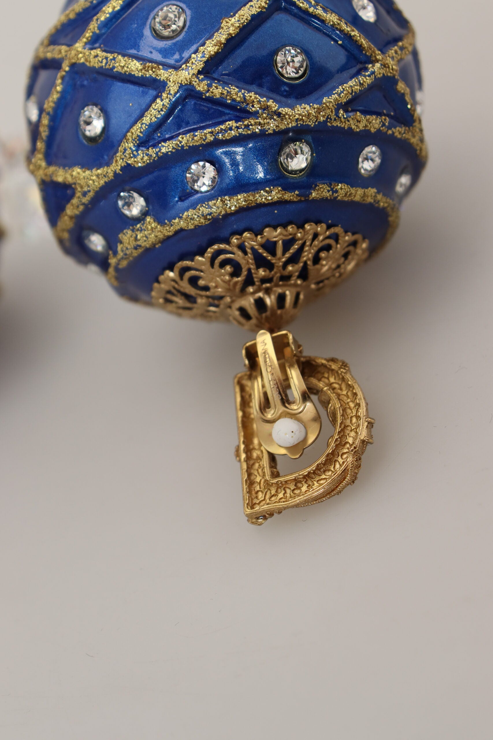 Dolce & Gabbana Gold Brass Blue Dangle Ball Crystal Clip On Earrings -   -  Dolce & Gabbana.