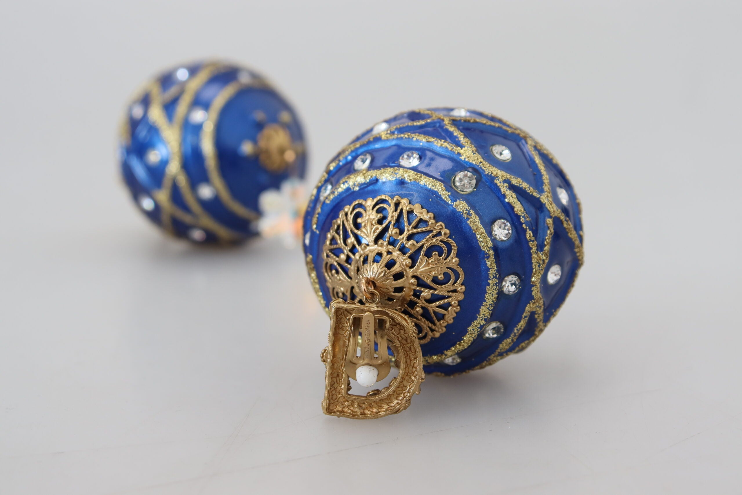 Dolce & Gabbana Gold Brass Blue Dangle Ball Crystal Clip On Earrings -   -  Dolce & Gabbana.