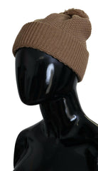 Dolce & Gabbana Brown Solid Knitted Fur Ball Winter Beanie Hat -   -  Dolce & Gabbana.