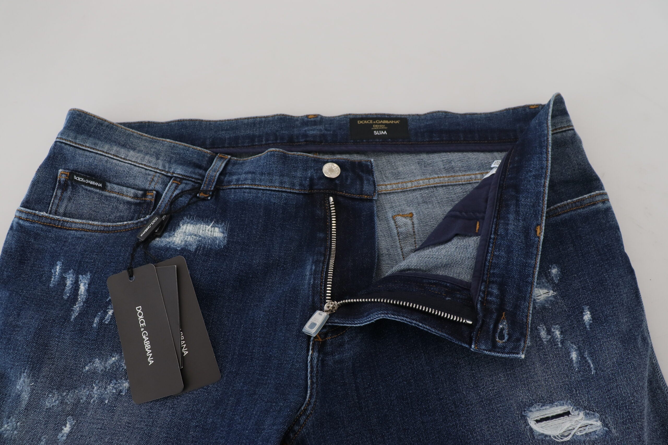 Dolce & Gabbana Blue Tattered Cotton Stretch Slim Denim Jeans -   -  Dolce & Gabbana.