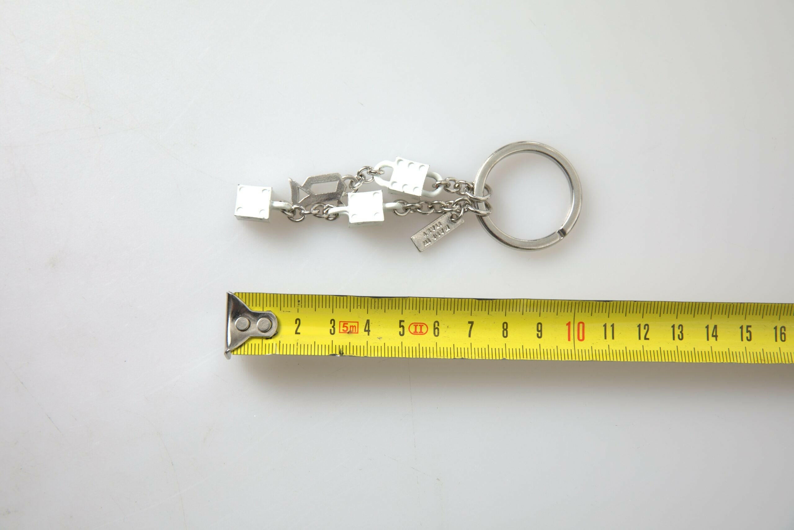 Dolce & Gabbana Silver Tone Metal DG Logo Engraved Keyring Keychain -   -  Dolce & Gabbana.