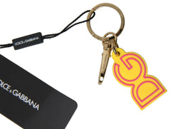 Dolce & Gabbana Yellow Rubber DG Logo Gold Brass Metal Keyring Keychain -   -  Dolce & Gabbana.