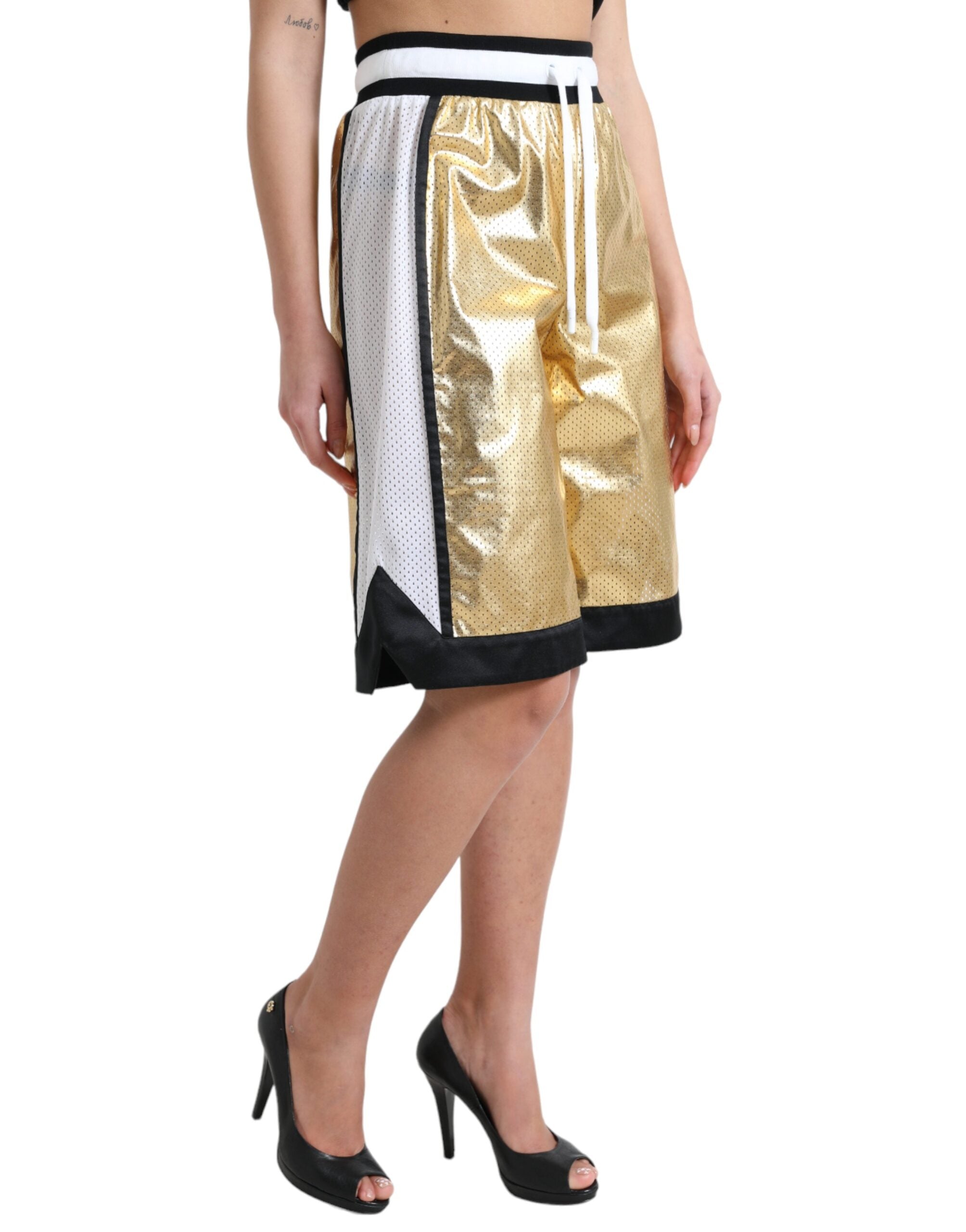 Dolce & Gabbana Gold Polyester Perforated High Waist Shorts -   -  Dolce & Gabbana.