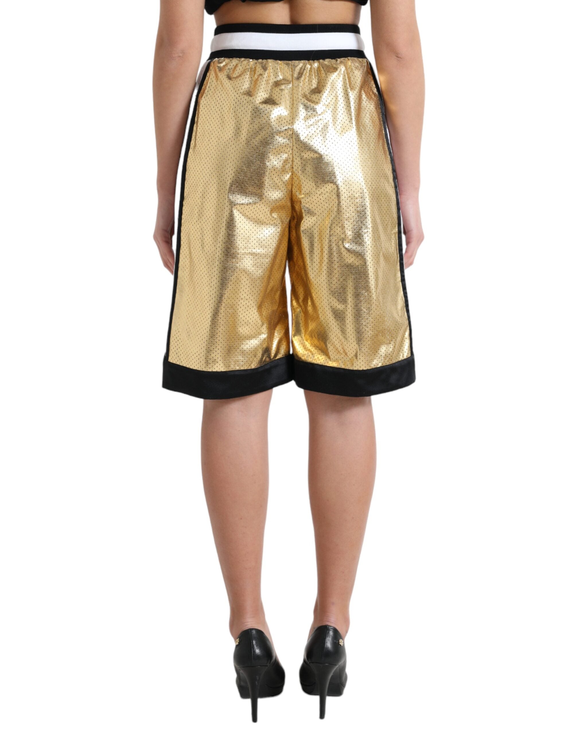 Dolce & Gabbana Gold Polyester Perforated High Waist Shorts -   -  Dolce & Gabbana.