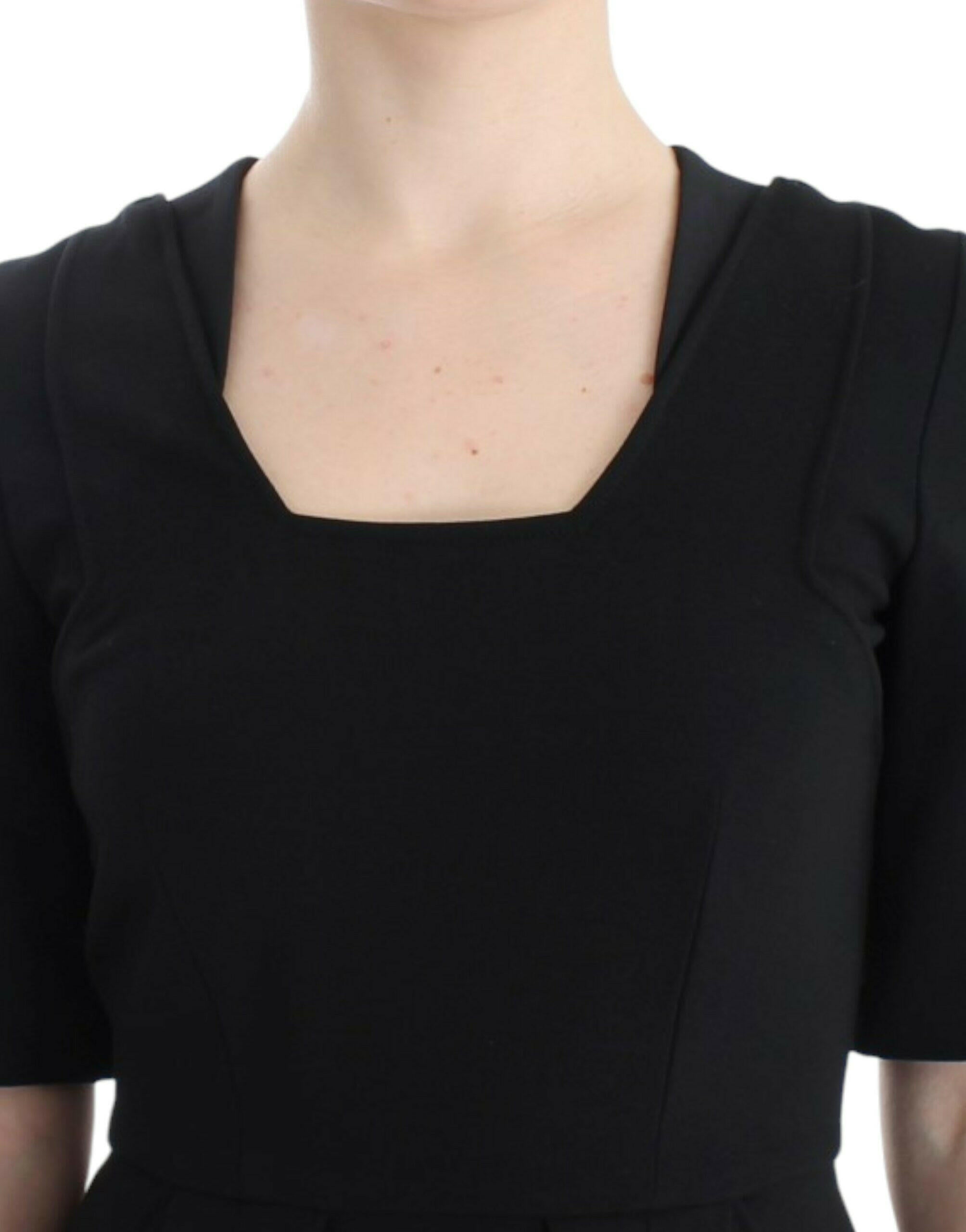 CO|TE Black short sleeve venus dress -   -  CO|TE.