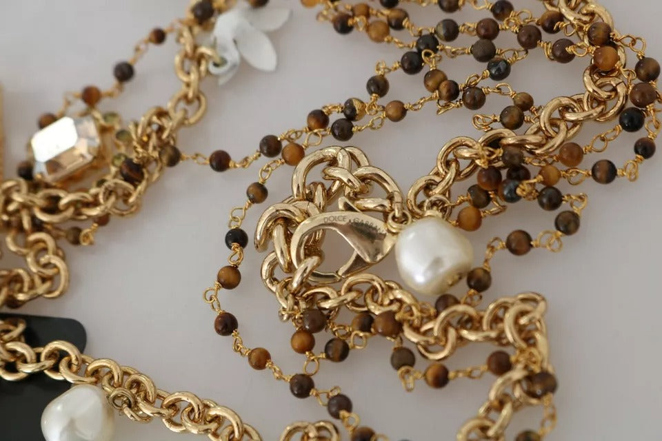 Dolce & Gabbana Gold Brass Crystal Floral Statement Charms Necklace -   -  Dolce & Gabbana.
