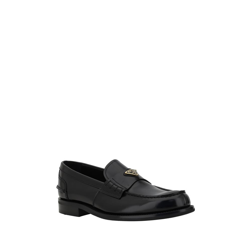 Prada Triangular plaque Loafers -   -  Prada.