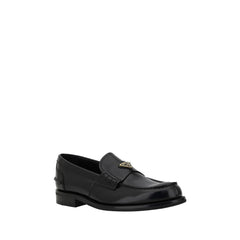 Prada Triangular plaque Loafers -   -  Prada.