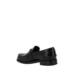 Prada Triangular plaque Loafers -   -  Prada.