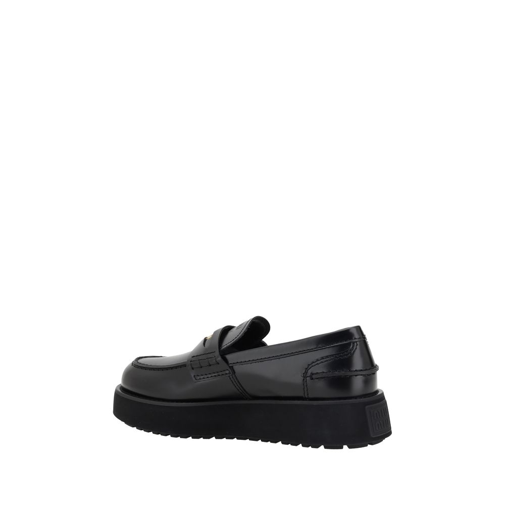 Miu Miu Leather Loafers -   -  Miu Miu.