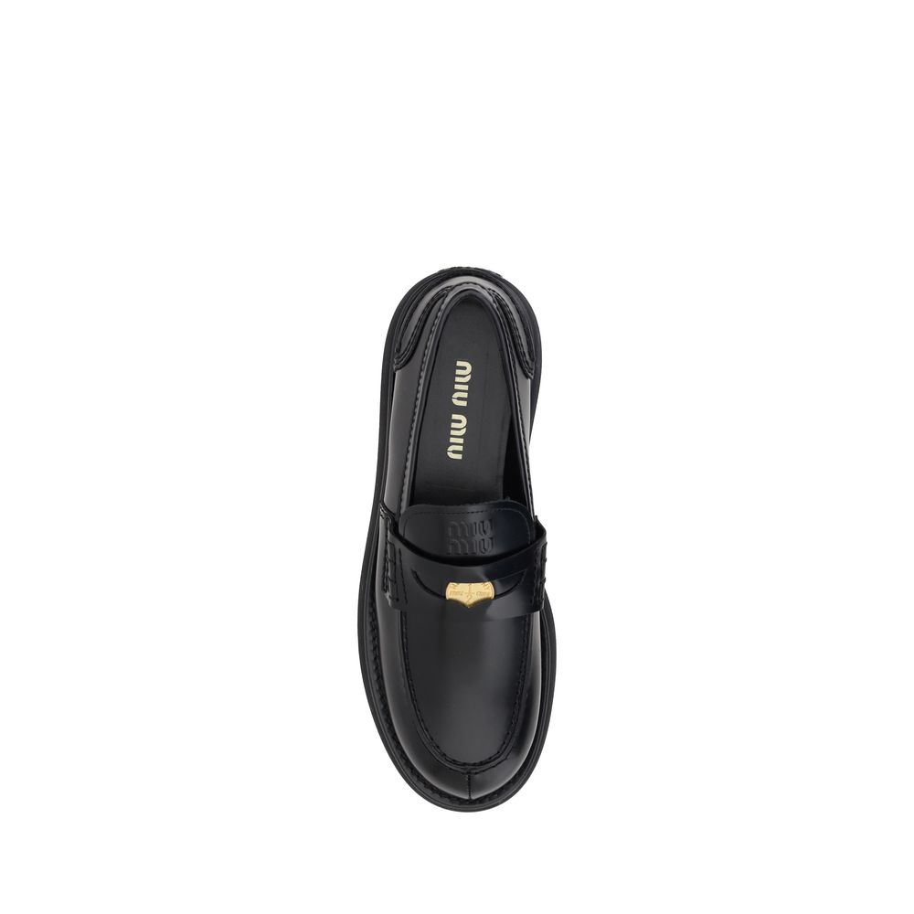 Miu Miu Leather Loafers -   -  Miu Miu.