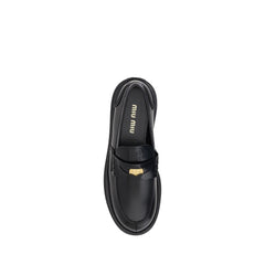 Miu Miu Leather Loafers -   -  Miu Miu.