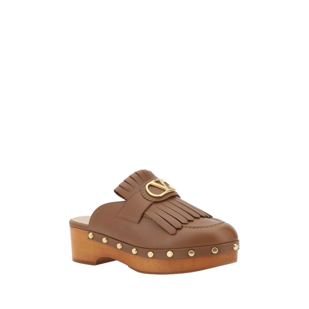 Valentino Garavani Leather Mules -   -  Valentino Garavani.