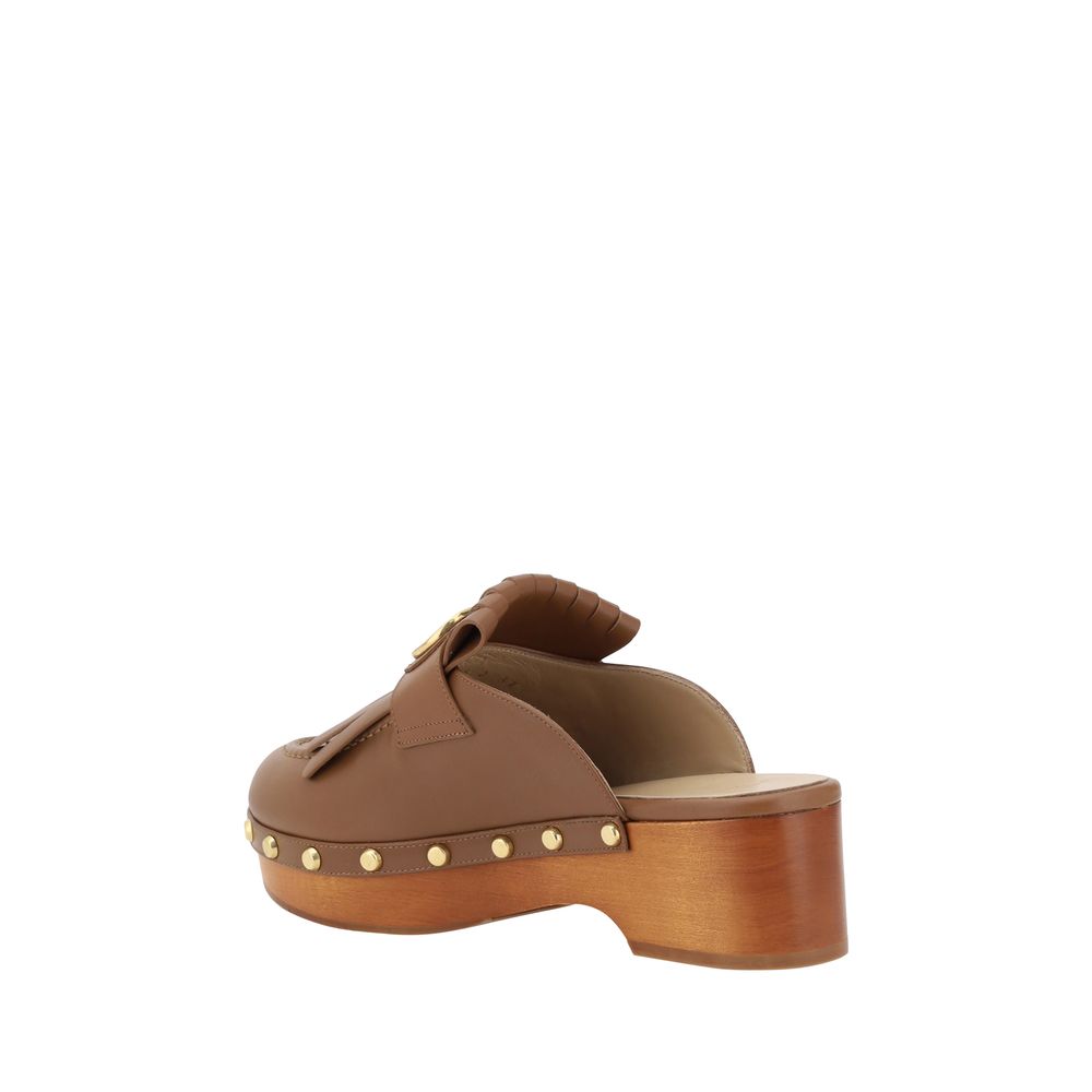 Valentino Garavani Leather Mules -   -  Valentino Garavani.