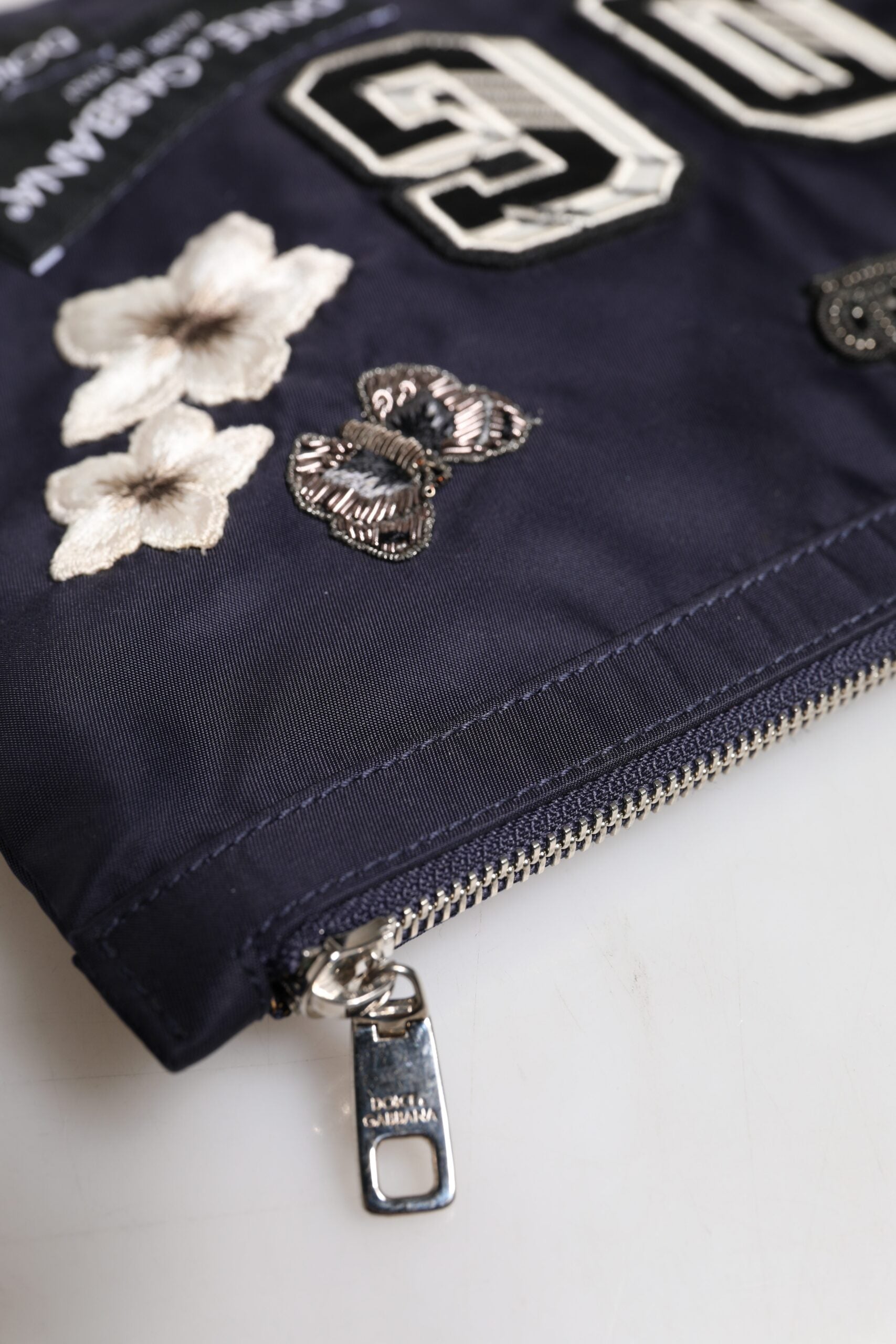Dolce & Gabbana Blue DG Logo Patch Embellished Pouch Clutch Bag -   -  Dolce & Gabbana.