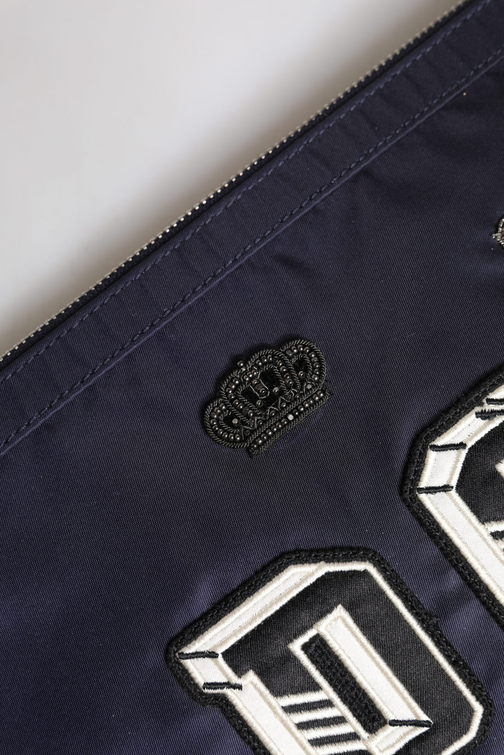 Dolce & Gabbana Blue DG Logo Patch Embellished Pouch Clutch Bag -   -  Dolce & Gabbana.