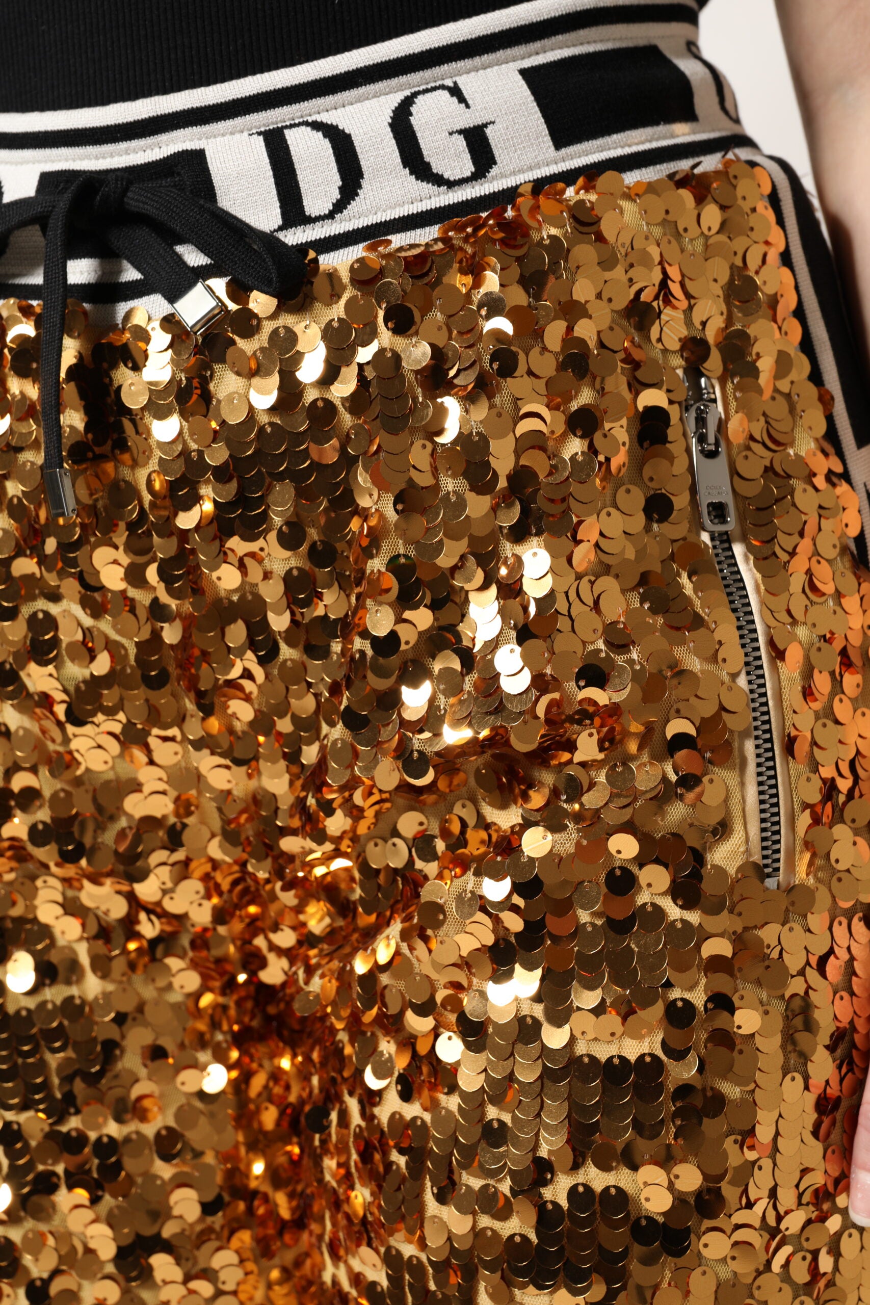 Dolce & Gabbana Metallic Gold DG Logo Sequined Jogger Pants -   -  Dolce & Gabbana.