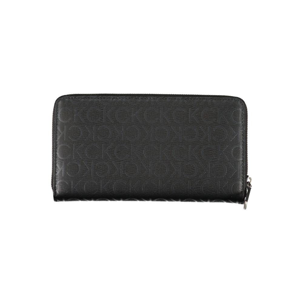 Calvin Klein Sleek Designer Three-Compartment Wallet -   -  Calvin Klein.